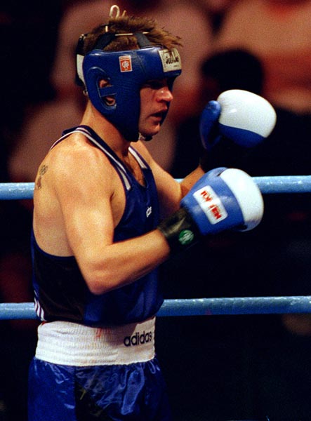 Canada's Mike Strange competing in the boxing event at the 1996 Atlanta Summer Olympic Games. (CP PHOTO/COA/Scott Grant)