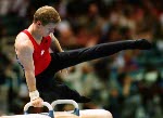 Canada's Kris Burley competing in the gymnastics event at the 1996 Atlanta Summer Olympic Games. (CP PHOTO/COA/Scott Grant)