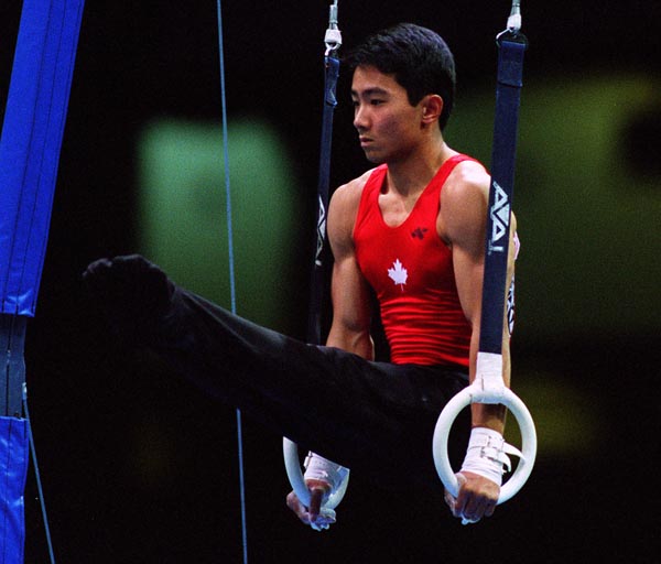Canada's Richard Ikeda competing in the gymnastics event at the 1996 Atlanta Summer Olympic Games. (CP PHOTO/COA/Scott Grant)
