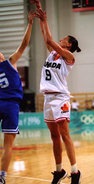 Canada's Jodi Evans (right) playing women's basketball at the 1996 Atlanta Summer Olympic Games. (CP PHOTO/COA/Mike Ridewood)
