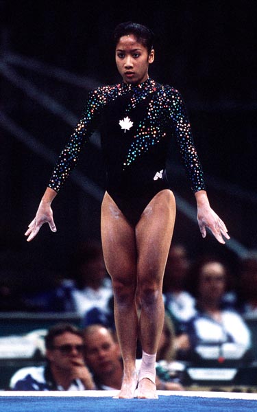 Canada's Jennifer Exaltacion competing in the gymnastics event at the 1996 Atlanta Summer Olympic Games. (CP PHOTO/COA/Claus Andersen)