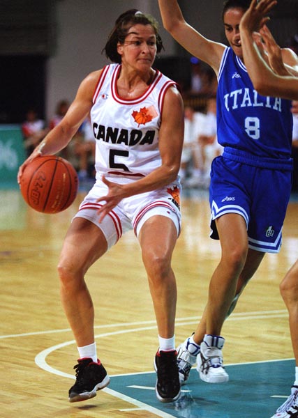 Canada's Karla Karch (left) playing women's basketball at the 1996 Atlanta Summer Olympic Games. (CP PHOTO/COA/Mike Ridewood)