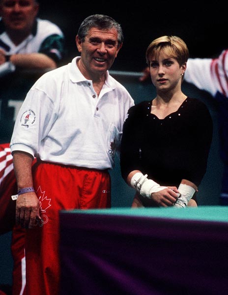 Canada's Shanyn MacEachern and gymnastics coach Alex Bard at the 1996 Atlanta Summer Olympic Games. (CP PHOTO/COA/Claus Andersen)