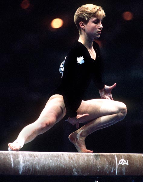 Canada's Shanyn MacEachern competing in the gymnastics event at the 1996 Atlanta Summer Olympic Games. (CP PHOTO/COA/Claus Andersen)