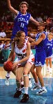 Canada's Andrea Blackwell dribbles the ball during women basketball action at the 1996 Atlanta Summer Olympic Games. (CP Photo/COA/Scott Grant)