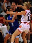 Canada's Kelly Boucher (white jersey) playing women's basketball at the 1996 Atlanta Summer Olympic Games. (CP PHOTO/COA/Mike Ridewood)