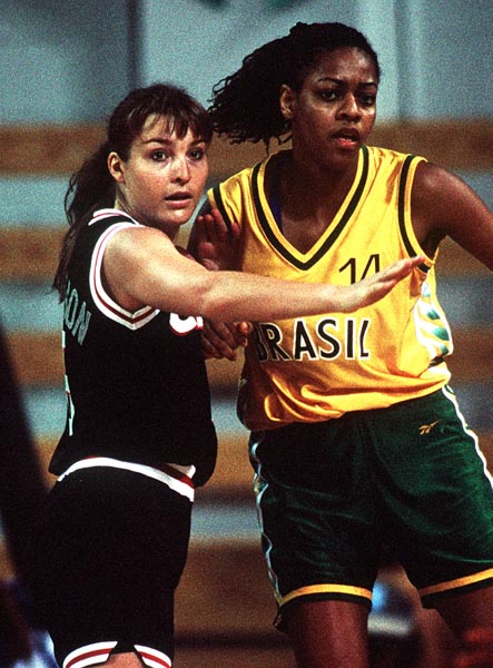 Canada's Camille Thompson (black jersey) playing women's basketball at the 1996 Atlanta Summer Olympic Games. (CP PHOTO/COA/Mike Ridewood)