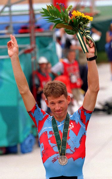 Canada's Brian Walton celebrates the silver medal he won for the men's cycling points race at the 1996 Atlanta Summer Olympic Games. (CP PHOTO/COA/Mike Ridewood)
