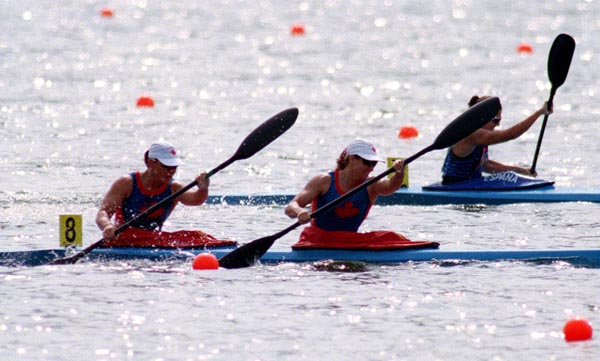 Canada's Corrina Kennedy and Marie Jose Gibeau (foreground) competing in the Kayak event at the 1996 Atlanta Summer Olympic Games. (CP PHOTO/COA/Mike Ridewood)