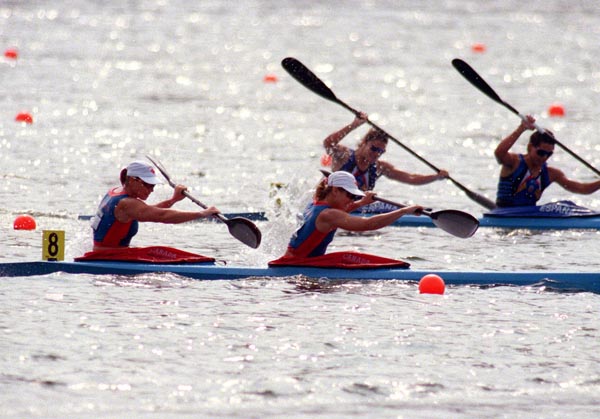 Canada's Corrina Kennedy and Marie Josee Gibeau (foreground) competing in the Kayak event at the 1996 Atlanta Summer Olympic Games. (CP PHOTO/COA/Mike Ridewood)