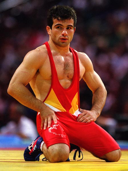 Canada's Guivi Sissaouri competing in the wrestling event at the 1996 Atlanta Summer Olympic Games. (CP PHOTO/COA/Claus Andersen)