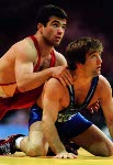 Canada's Guivi Sissaouri (left) competing in the wrestling event at the 1996 Atlanta Summer Olympic Games. (CP PHOTO/COA/Claus Andersen)