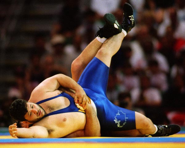 Canada's Andy Borodow competing in the wrestling event at the 1996 Atlanta Summer Olympic Games. (CP PHOTO/COA/Scott Grant)
