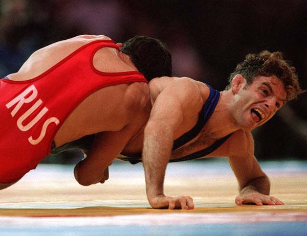 Canada's Paul Ragusa (right) competing in the wrestling event at the 1996 Atlanta Summer Olympic Games. (CP PHOTO/COA/Claus Andersen)