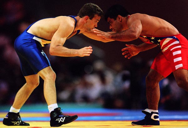 Canada's Craig Roberts (left) competing in the wrestling event at the 1996 Atlanta Summer Olympic Games. (CP PHOTO/COA/Claus Andersen)