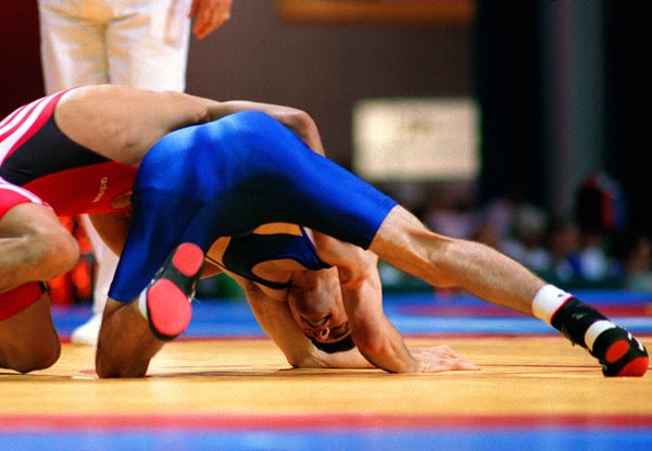 Canada's Greg Woodcroft competing in the wrestling event at the 1996 Atlanta Summer Olympic Games. (CP PHOTO/COA/Scott Grant)
