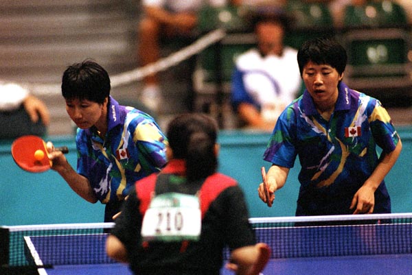Canada's Barbara Chiu (left) and Lijuan Geng in action against their opponents during the table tennis event at the 1996 Atlanta Summer Olympic Games. (CP PHOTO/COA/Scott Grant)
