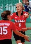 Canada's Katrina Vonsass (left) and Michelle Sawatzky participate in volleyball action at the 1996 Atlanta Olympic Games. (CP Photo/COA/F. Scott Grant)