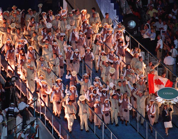 Canada's  Charmaine Crooks carries the flag during the opening ceremony at the 1996 Atlanta Summer Olympic Games. (CP PHOTO/COA/Mike RIdewood)