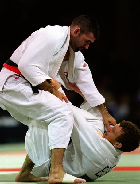 Canada's Nicolas Gill (top) competing in the Judo event at the 1996 Atlanta Summer Olympic Games. (CP PHOTO/COA/Scott Grant)