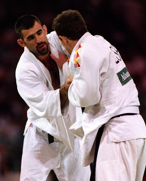 Canada's Nicolas Gill (left)  competing in the Judo event at the 1996 Atlanta Summer Olympic Games. (CP PHOTO/COA/Scott Grant)