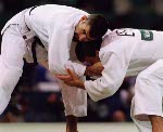 Canada's Nicolas Gill (top) competing in the Judo event at the 1996 Atlanta Summer Olympic Games. (CP PHOTO/COA/Scott Grant)