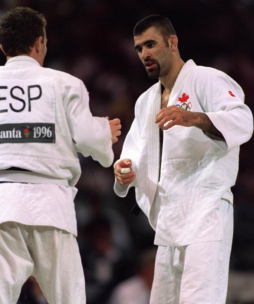 Canada's Nicolas Gill (right) competing in the Judo event at the 1996 Atlanta Summer Olympic Games. (CP PHOTO/COA/Scott Grant)