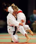 Canada's Nathalie Gosselin (bottom) competing in the Judo event at the 1996 Atlanta Summer Olympic Games. (CP PHOTO/COA/Scott Grant)