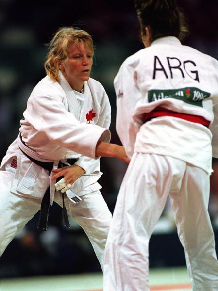 Canada's Nathalie Gosselin (left)  competing in the Judo event at the 1996 Atlanta Summer Olympic Games. (CP PHOTO/COA/Scott Grant)