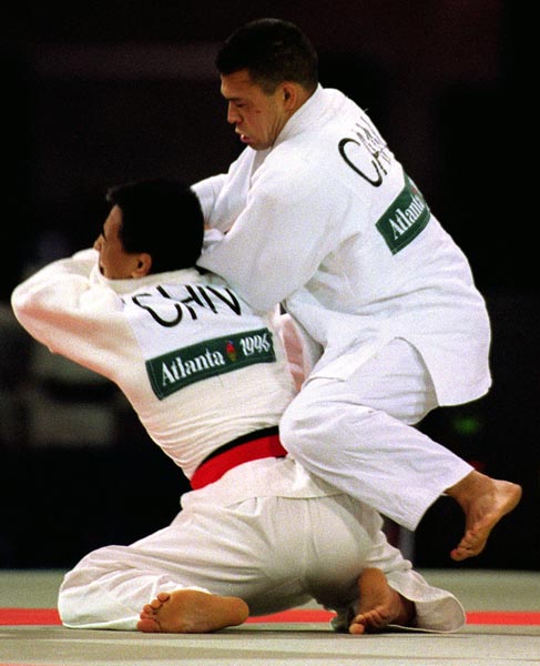 Canada's Taro Tan (right)  competing in the Judo event at the 1996 Atlanta Summer Olympic Games. (CP PHOTO/COA/Scott Grant)