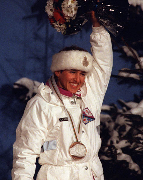 Canada's Myriam Bdard celebrates the bronze medal she won in the women's biathlon event at the 1992 Albertville Olympic winter Games. (CP PHOTO/COA/Ted Grant)