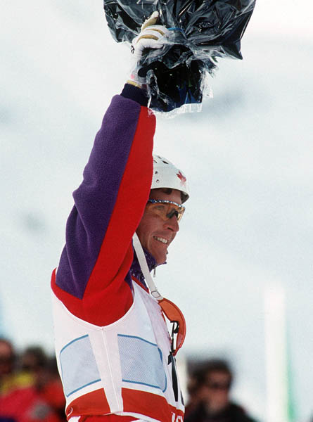 Canada's Philippe Laroche celebrates the gold medal he won in the aerial ski event at the 1992 Albertville Olympic winter Games. (CP PHOTO/COA/F. Scott Grant)