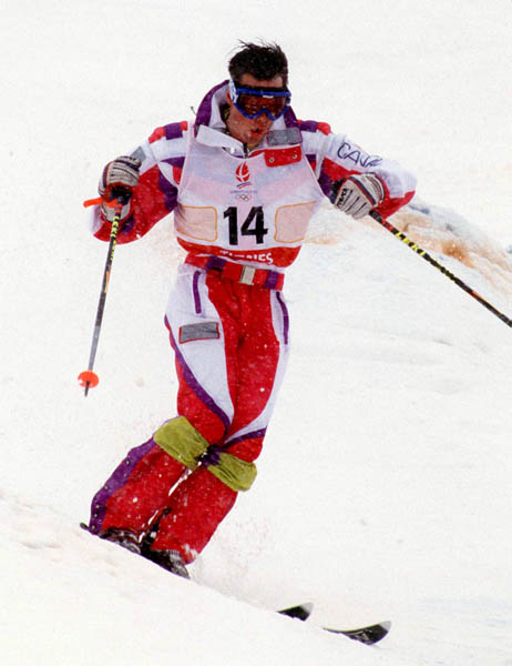 Canada's Jean-Luc Brassard competing in the freestyle moguls event at the 1992 Albertville Olympic winter Games. (CP PHOTO/COA/Scott Grant)