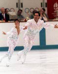 Canada's Isabelle Brasseur (left) and Loyd Eisler participate in the pairs figure skating event at the 1988 Winter Olympics in Calgary. (CP PHOTO/COA)