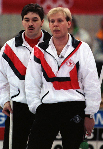 Canada's Kevin Park (left) and Kevin Martin competing in the curling event at the 1992 Albertville Olympic winter Games. (CP PHOTO/COA/Ted Grant)