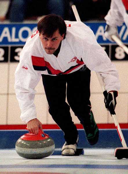 Canada's Dan Petryk competing in the curling event at the 1992 Albertville Olympic winter Games. (CP PHOTO/COA/Ted Grant)