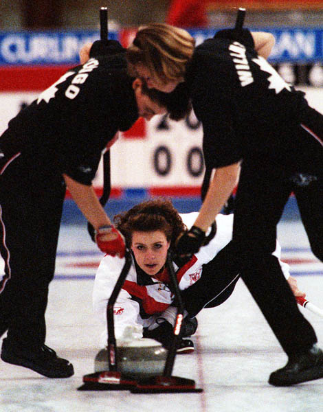 Canada's Melissa Soligo (left) Julie Sutton (centre) and Karri Willms competing in the curling event at the 1992 Albertville Olympic winter Games. (CP PHOTO/COA/Ted Grant)