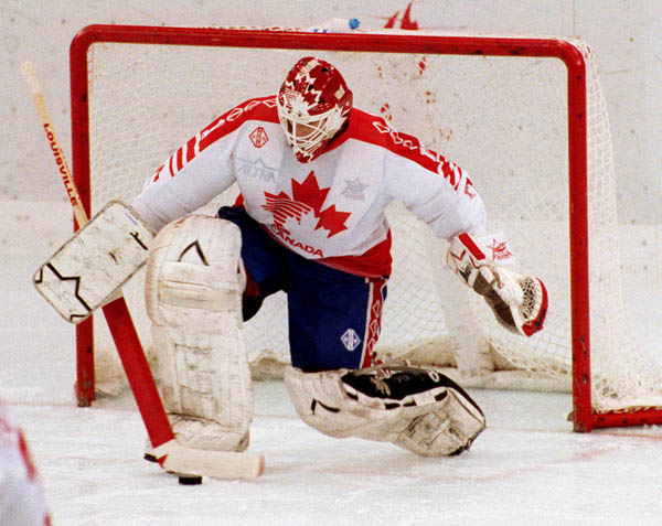 Canada's goalie, Sean Burke competing in the Gold Medal game against the Unified Team in which Canada won Silver at the 1992 Albertville Olympic winter Games. (CP PHOTO/COA/Scott Grant)