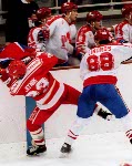 Canada's Eric Lindros (right) competing in the Gold Medal game against the Unified Team in which Canada won Silver at the 1992 Albertville Olympic winter Games. (CP PHOTO/COA/Scott Grant)