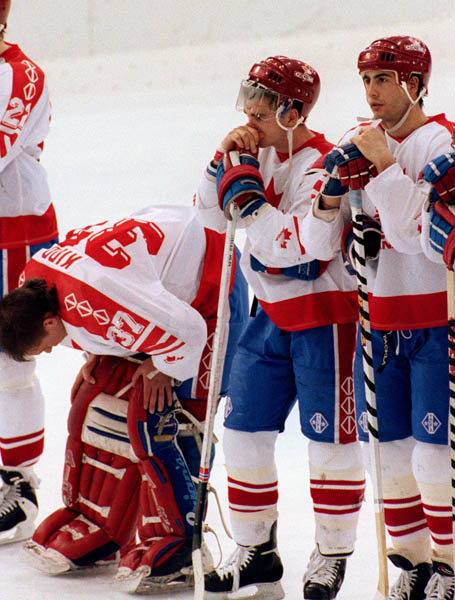 Canada's Trevor Kidd (goalie) shows his disappointment after losing the Gold Medal game against the Unified Team in which Canada won Silver at the 1992 Albertville Olympic winter Games. (CP PHOTO/COA/Scott Grant)