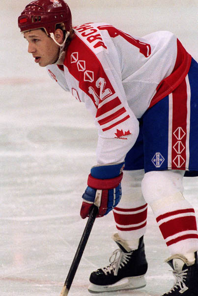 Canada's Dave Archibald competing in the hockey event against Norway at the 1992 Albertville Olympic winter Games. (CP PHOTO/COA/Scott Grant)