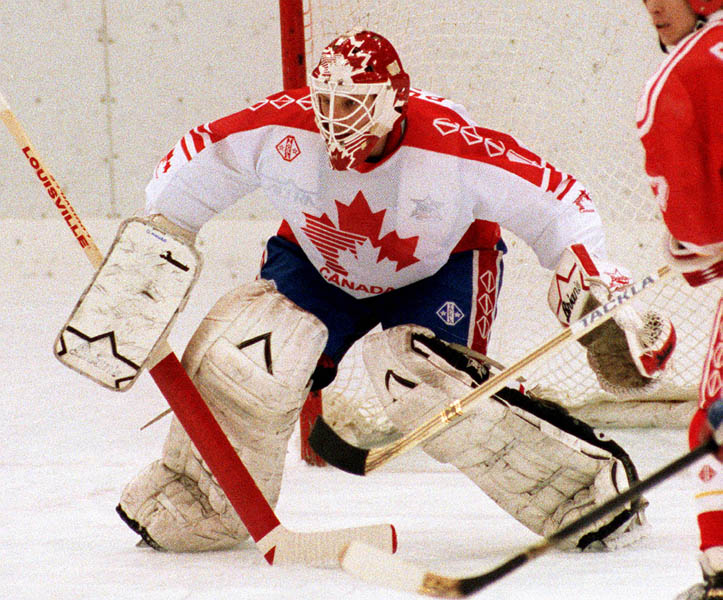 Canada's goalie, Sean Burke competing in the Gold Medal game against the Unified Team in which Canada won Silver at the 1992 Albertville Olympic winter Games. (CP PHOTO/COA/Scott Grant)