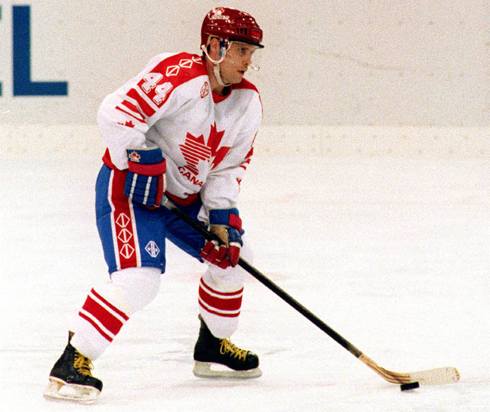 Canada's Curt Giles competing in the hockey event against Norway at the 1992 Albertville Olympic winter Games. (CP PHOTO/COA/Scott Grant)