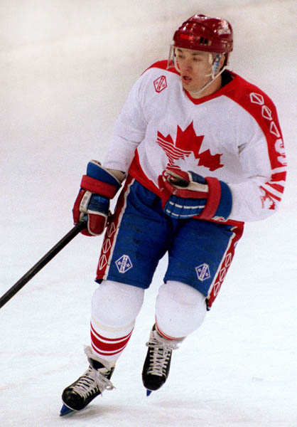 Canada's Joe Juneau competing in the Gold Medal game against the Unified Team in which Canada won Silver at the 1992 Albertville Olympic winter Games. (CP PHOTO/COA/Scott Grant)
