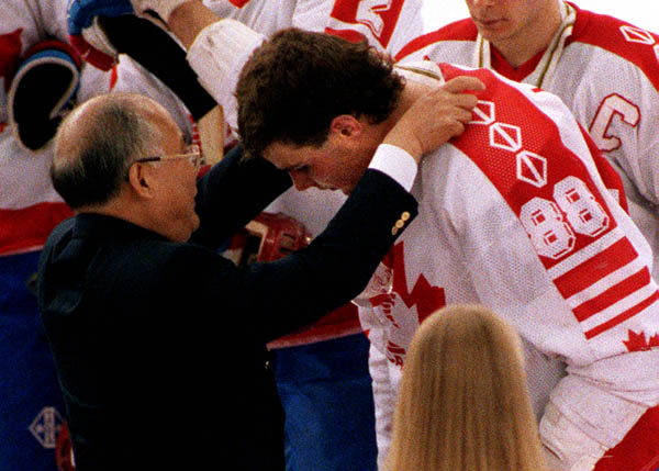 Canada's Eric Lindros receives his medal after the Gold Medal game against the Unified Team in which Canada won Silver at the 1992 Albertville Olympic winter Games. (CP PHOTO/COA/Scott Grant)