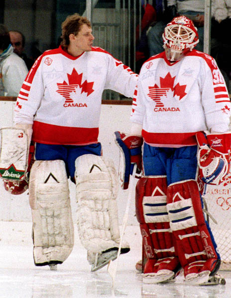 Canada's Sean Burke and Trevor Kidd competing in the hockey event against Norway at the 1992 Albertville Olympic winter Games. (CP PHOTO/COA/Scott Grant)