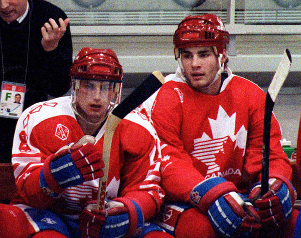 Canada's Fabian Joseph (left) and Eric Lindros take a break from competition at the 1992 Albertville Winter Olympics. (CP Photo/ COA/ Scott Grant)