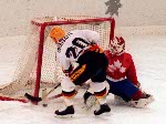 Canada's Joe Juneau competing in the hockey event against Germany at the 1992 Albertville Olympic winter Games. (CP PHOTO/COA/Scott Grant)