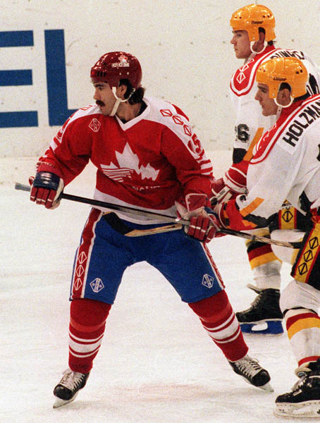 A Canadian unidentified player competing in the hockey event against Germany at the 1992 Albertville Olympic winter Games. (CP PHOTO/COA/Scott Grant)