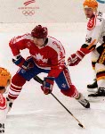 Canada's Joe Juneau competing in the Gold Medal game against the Unified Team in which Canada won Silver at the 1992 Albertville Olympic winter Games. (CP PHOTO/COA/Scott Grant)